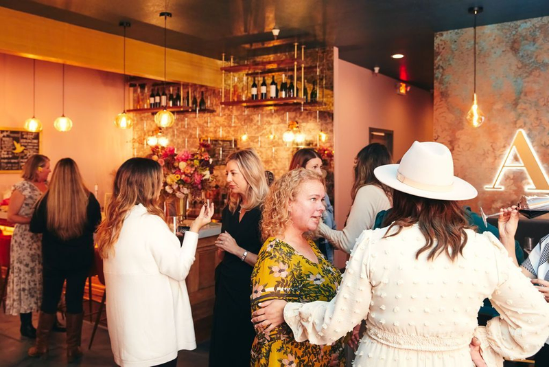 Women mingling at the Azur wine bar | Women Owned Wineries